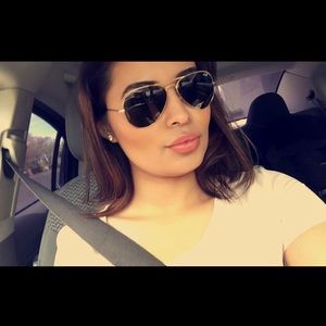 Black and gold Ray Ban Aviators